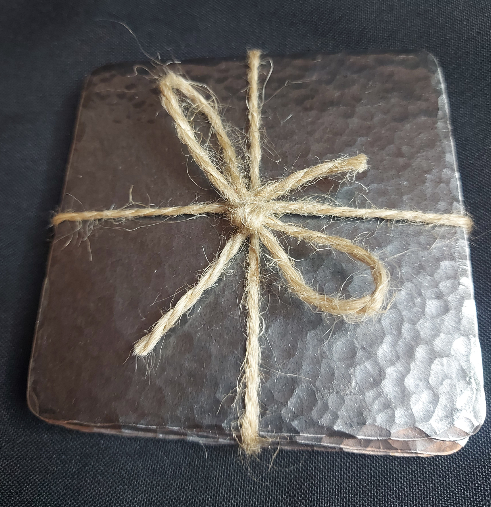 Set of 4 hammered effect steel coasters