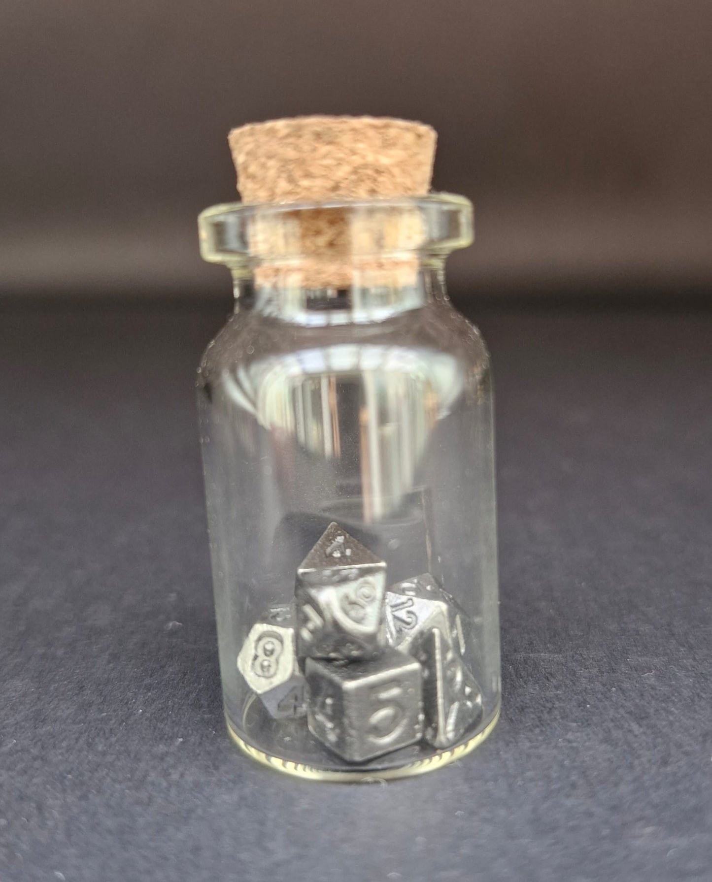 Miniature Dice in a vial