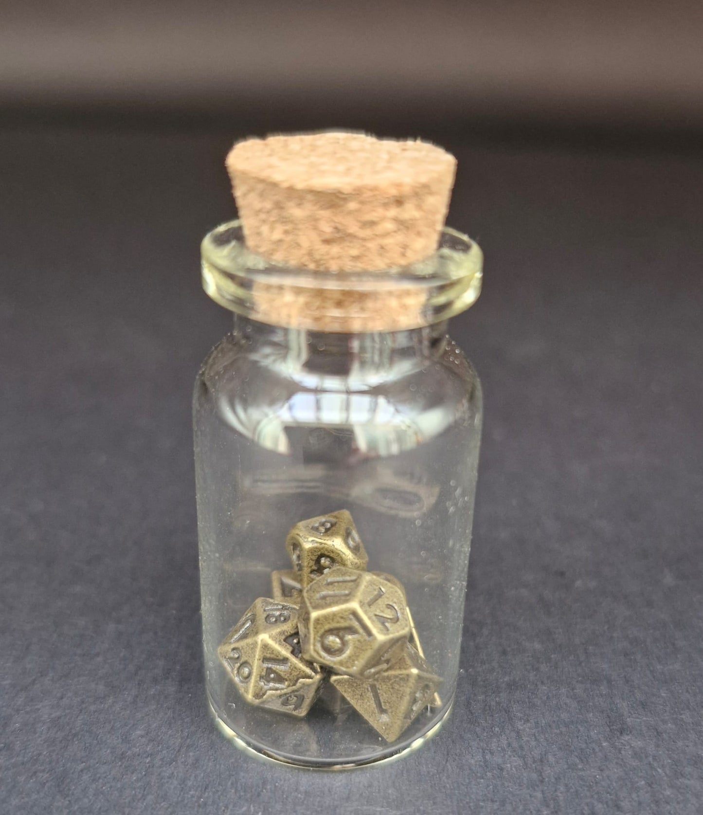 Miniature Dice in a vial
