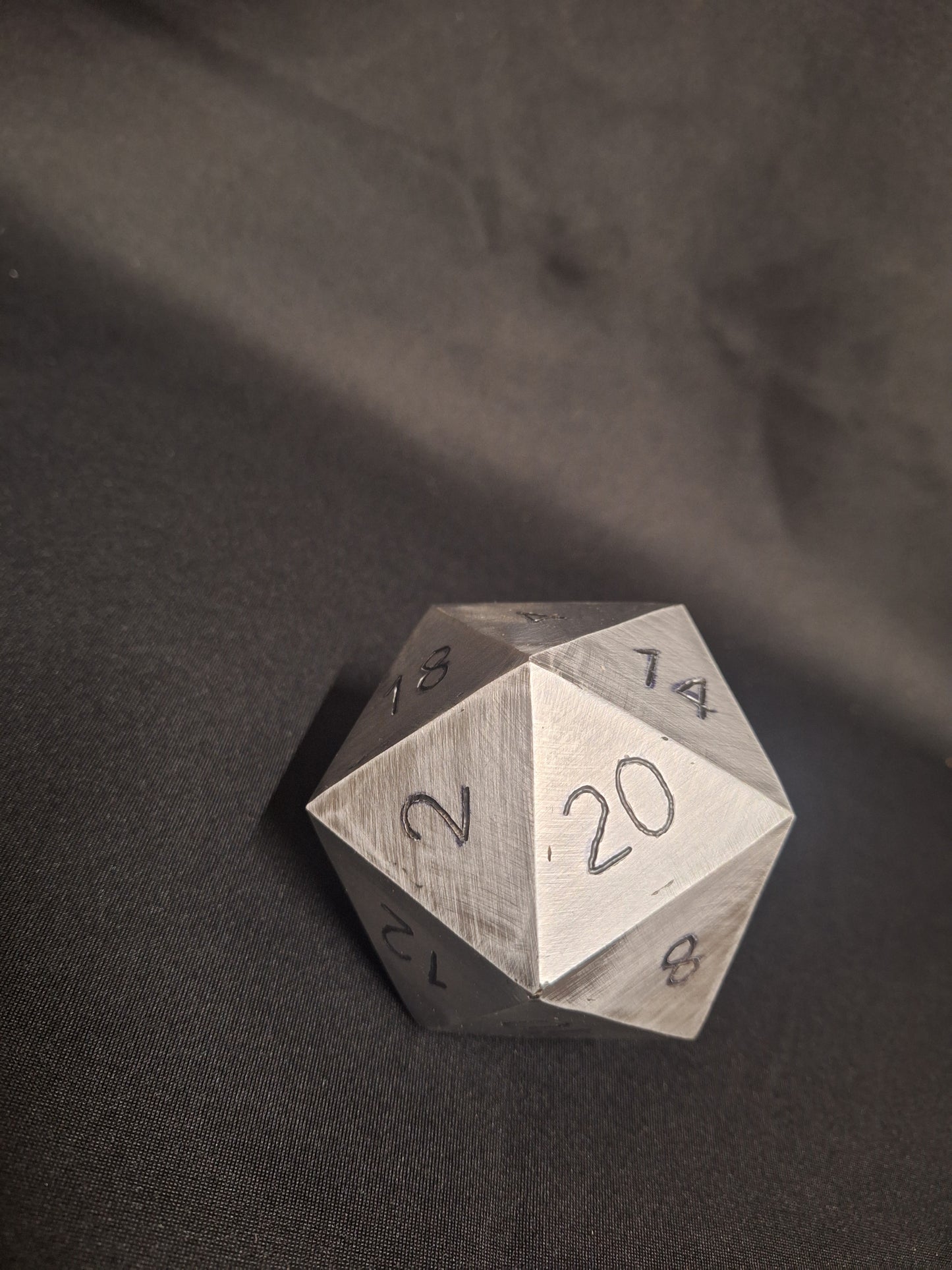 Palm sized Steel D20