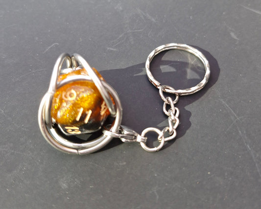 Caged D20 keyring, Honey