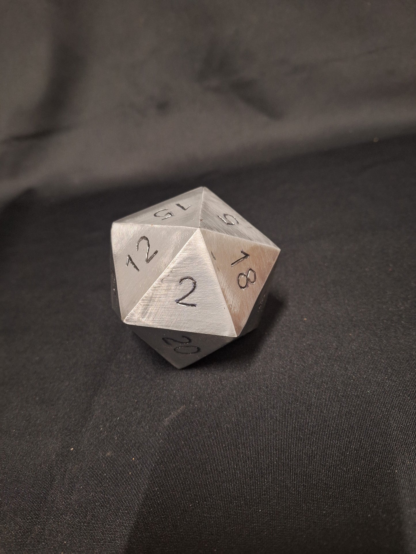 Palm sized Steel D20